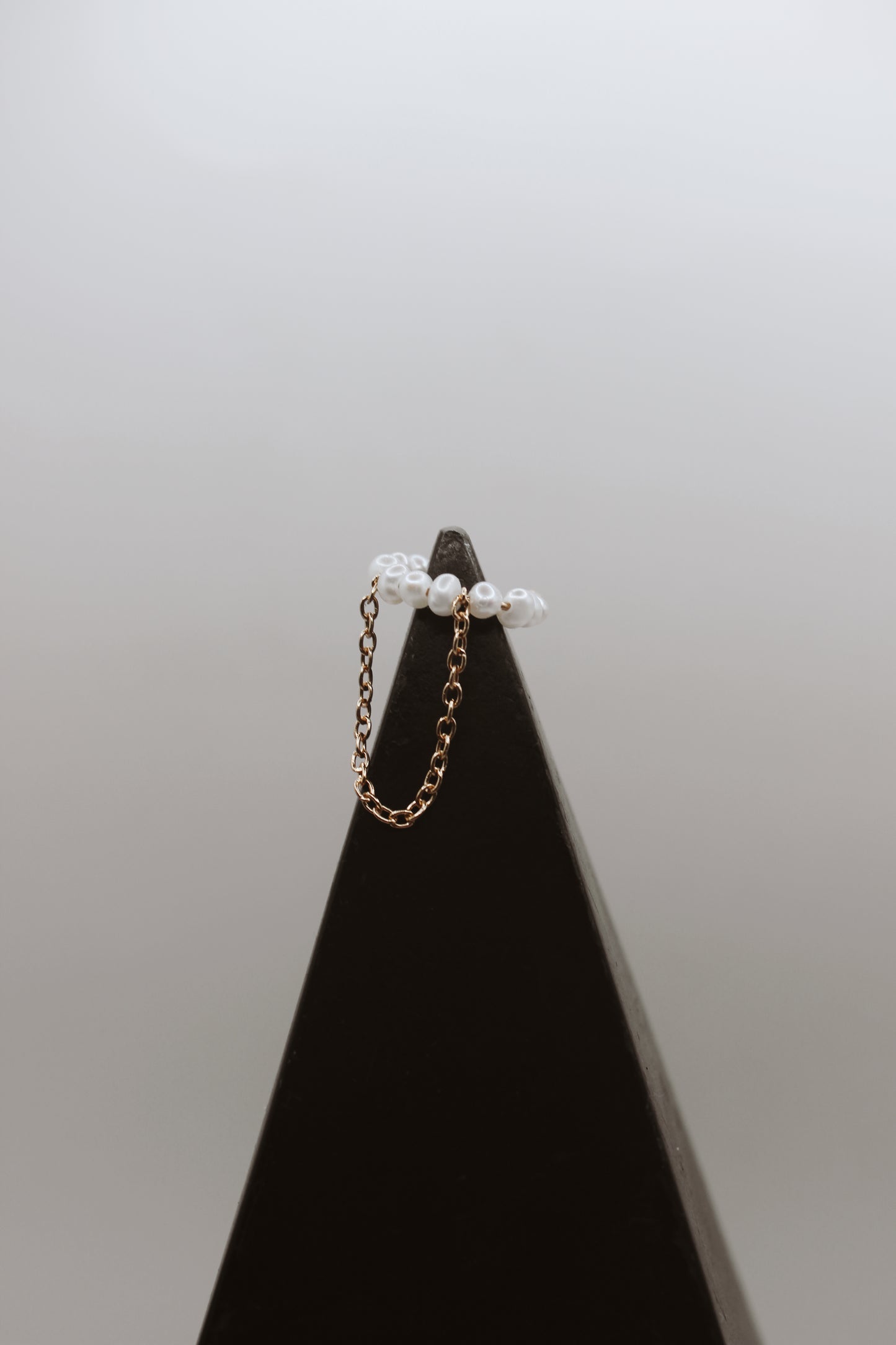 Pearl ear cuff with chain